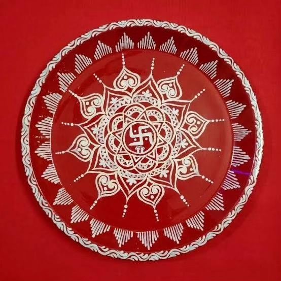 Aipan Art on Pooja Thaal for your temple decoration. If you are looking for an auspicious thaali, then this is perfect for you. Fully hand-painted…This can be used as pooja arti thali on various occasions such as Holi, Diwali, Raksha Bandhan, Karva Chauth, etc.